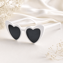 Load image into Gallery viewer, Heart shaped bridal sunglasses for bridesmaids, hen parties and wedding photo props, styled as a fun bridal party gift accessory.