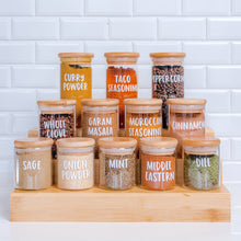 Load image into Gallery viewer, Organised spice jars on spice rack featuring Love and Labels vinyl labels