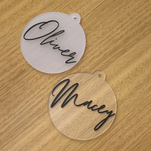 Load image into Gallery viewer, Close-up of a sleek, custom name acrylic bauble from Love and Labels, handcrafted in Australia