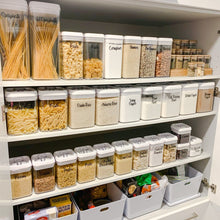 Load image into Gallery viewer, A view of a pantry shelf filled with labeled jars, highlighting the neat organisation of pantry whole foods .