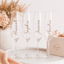 Load image into Gallery viewer, Personalised Champagne Glass Decal rose gold name labels featured on champagne glasses with custom bridal party names
- Love and Labels
