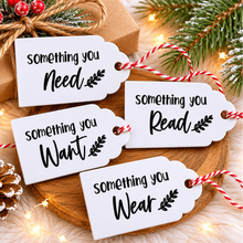 Load image into Gallery viewer, Reusable Christmas gift tags in want, need, wear, read, share and do categories for festive present wrapping. made from acrylic and vinyl
