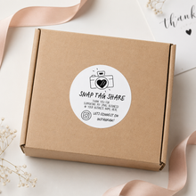 Load image into Gallery viewer, Custom Instagram handle sticker on kraft small business packaging box for social media tags and customer unboxing.
