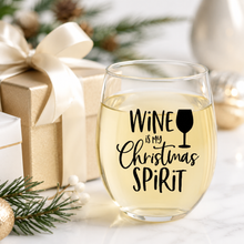 Load image into Gallery viewer, Wine Is My Christmas Spirit vinyl decal on stemless wine glass with festive Christmas gift styling.
