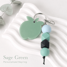 Load image into Gallery viewer, Personalised teacher keyrings and bag charms with acrylic apple name tags, silicone beads and silver hardware for end of year teacher gifts.
