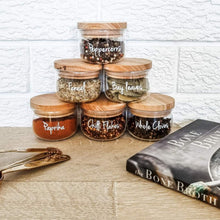 Load image into Gallery viewer, High-quality vinyl spice labels applied to modern glass spice jars.
