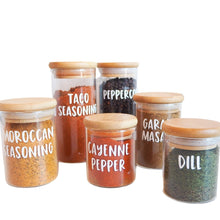 Load image into Gallery viewer, Close-up of custom spice jar labels with a variety of fonts and colors on neatly arranged jars.
