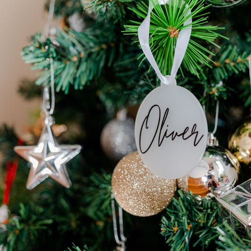 Personalised acrylic bauble featuring custom name label – Australian made and perfect for bespoke Christmas home décor.